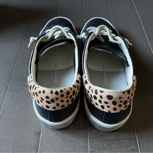 Black leather Dolce Vita sneakers with cheetah detail and silver around heel